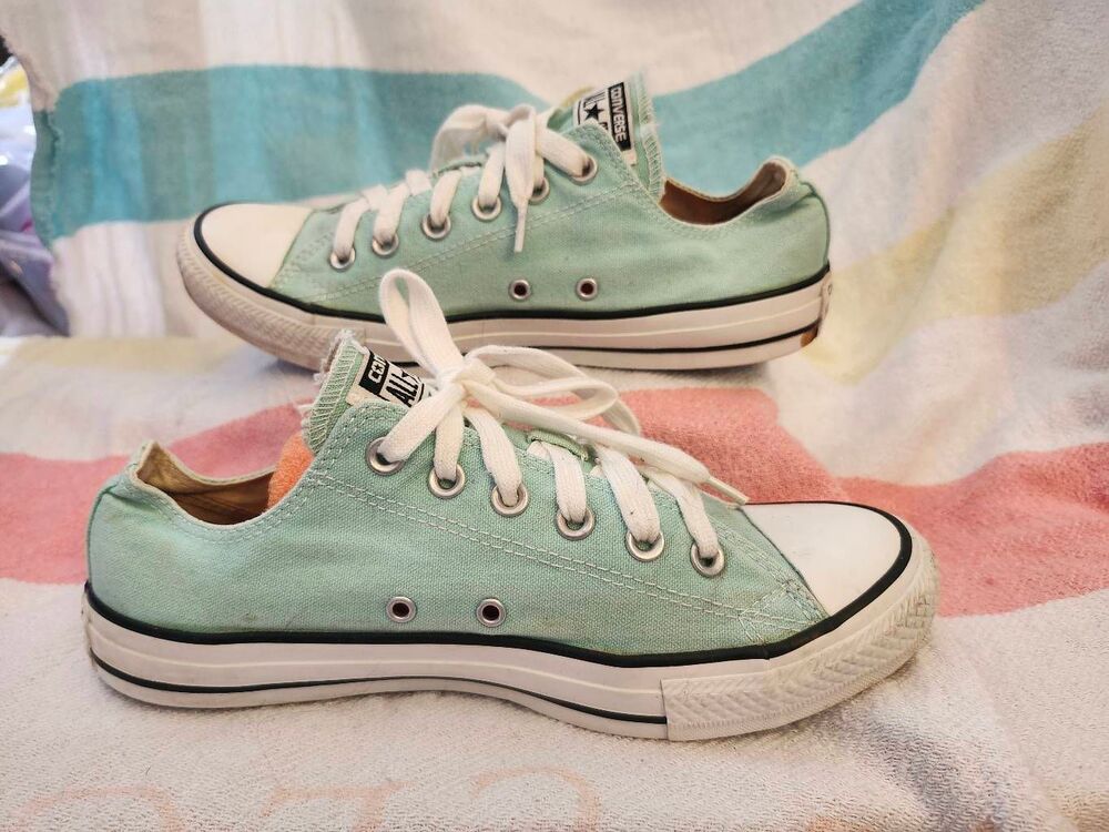 Converse Chuck Taylor All Star Ox low-top sneakers featuring white laces, a rubb